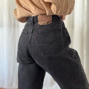 Vintage Levi’s 501 for women washed black six button fly long inseam made in CA